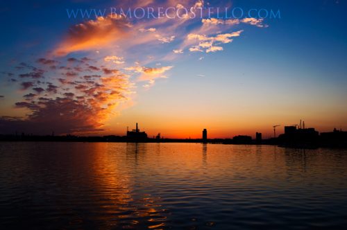 Vibrant Orange sunset over Baltimore Marylands Federal Hill neighborhood.